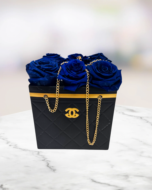 Blue Preserved Roses in a Chanel Gift Bag